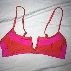 Has been worn before but still in perfect condition.